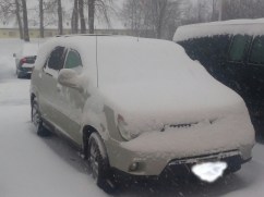 Snow Covered Car
